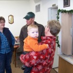 My great-nephew Trent will turn one year old in March. At Christmas on January 16, 2011, at Norton Church, he thought Randy was a suspicious character lurking around with the camera.